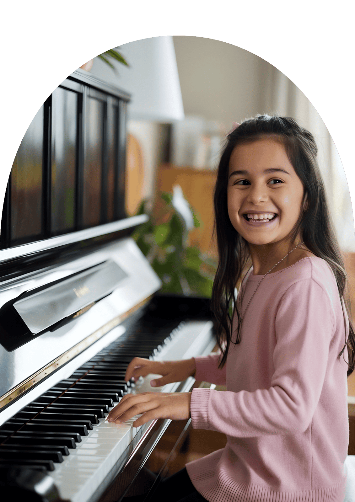 A joyful child learning keyboard during an online keyboard class, perfect for kids exploring music through personalized online music lessons.