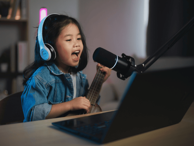 Child wearing headphones and attending an online western vocals class to learn to singing online